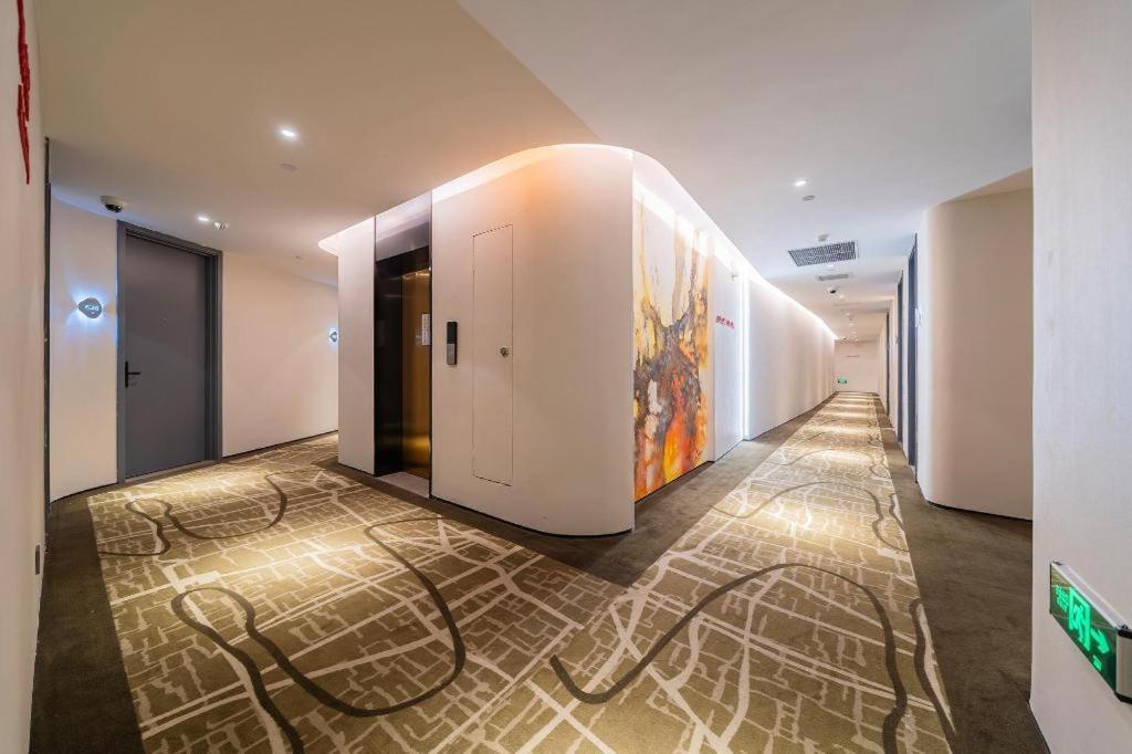 Hanting Premium Xinzhuang Business Center Hotel
