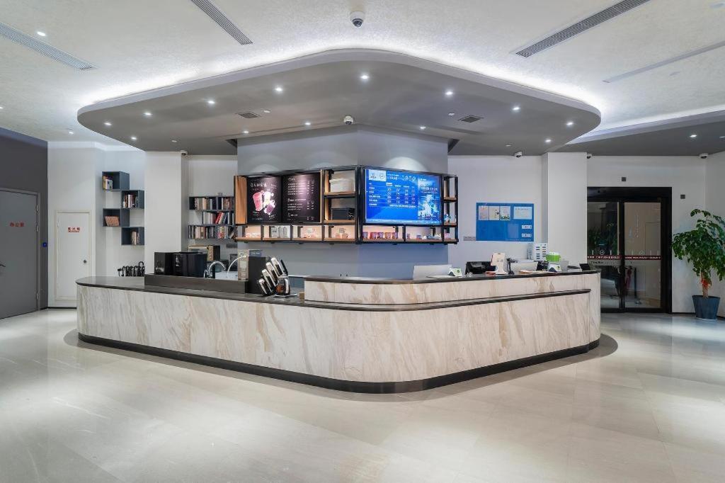 Hanting Premium Xinzhuang Business Center Hotel